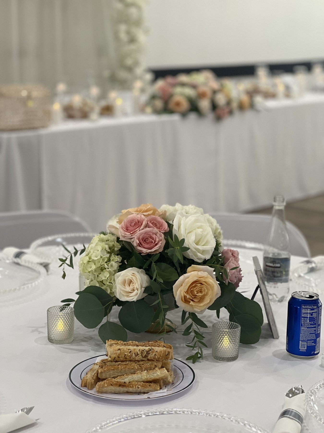 Decorated table with candlelight and floral centerpiece